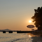 Besucher verlassen den Strand
